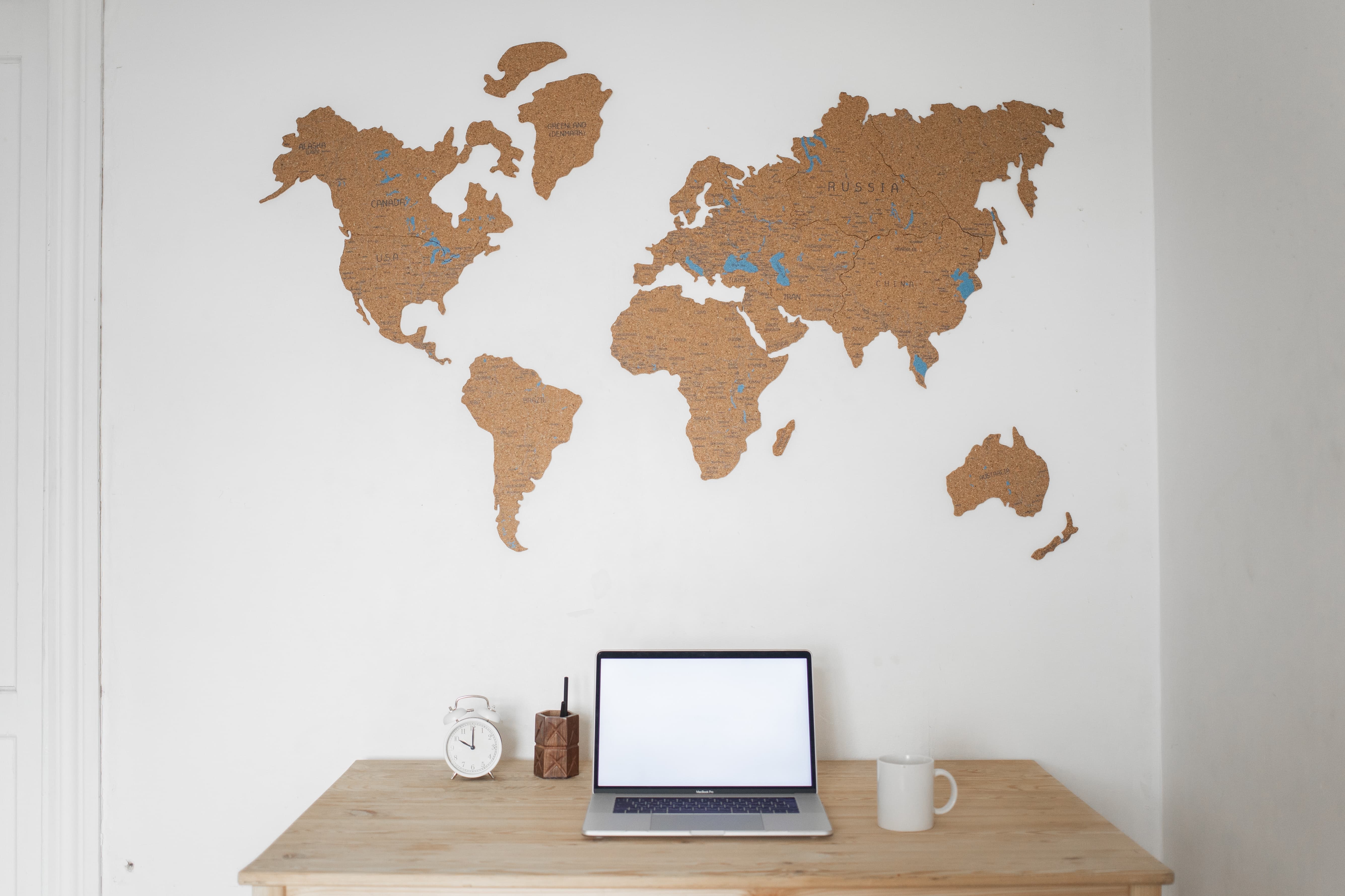 Terms and Conditions header image showing a map of the continents, mounted on the wall. 